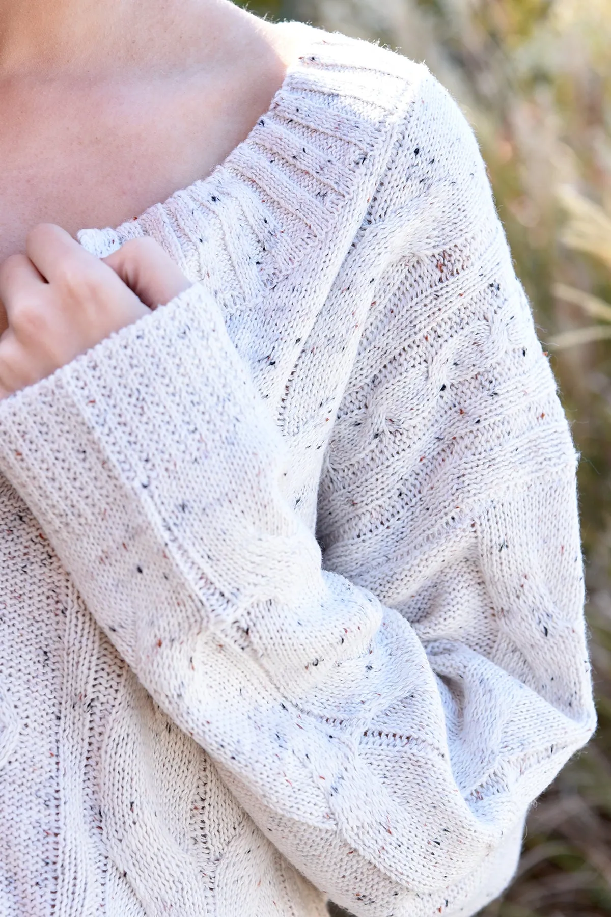 NEVER BEFORE SWEATER