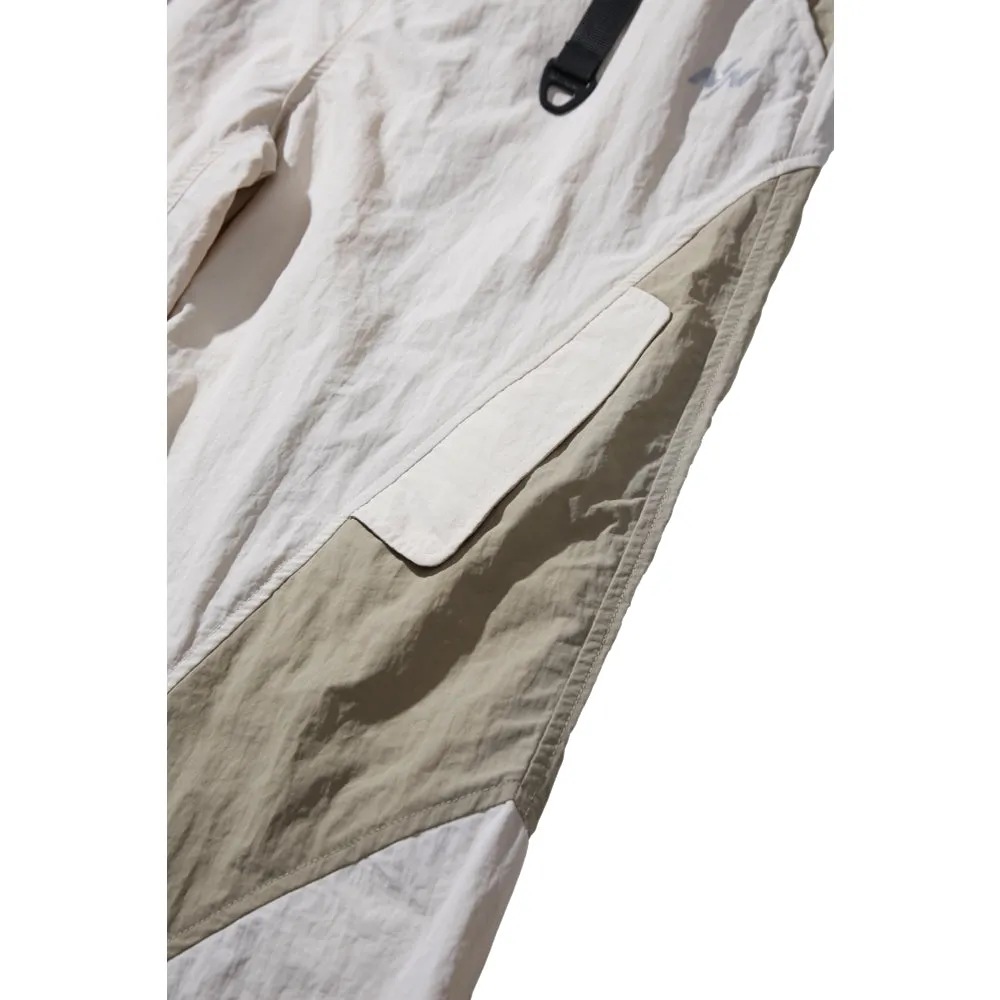 NINE POINT NINE GRADE ANKLE BREAKER PANTS-IVORY
