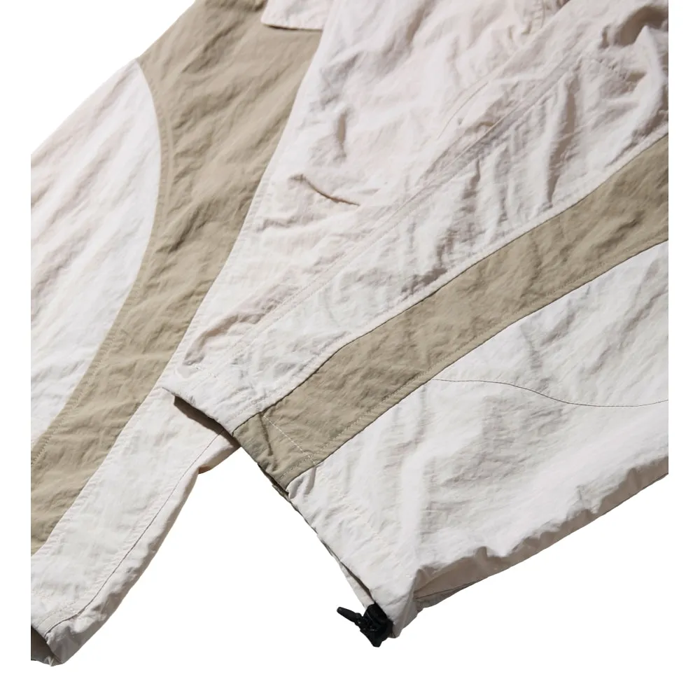 NINE POINT NINE GRADE ANKLE BREAKER PANTS-IVORY